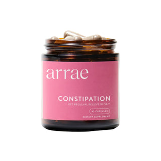 Jar of arrae constipation dietary supplement with pink label on a light gray background